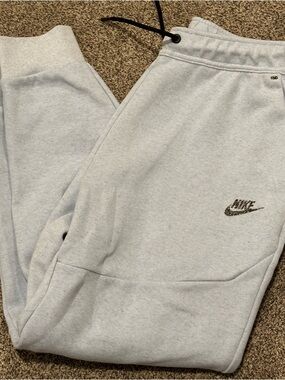 Nike Light Gray ladies Fleece Joggers with Black Drawstring